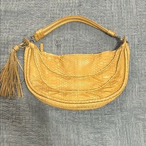 Chic Gold Hobo Bag with Tassel Accent